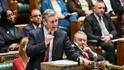 The new Labour government under Prime Minister Keir Starmer must point to headlight glare as one of the key issues to investigate in its transport policy, the RAC says. [Photo of Starmer in action as opposition leader on Feb. 7, 2024 in the U.K. Parliament’s House of Commons.]